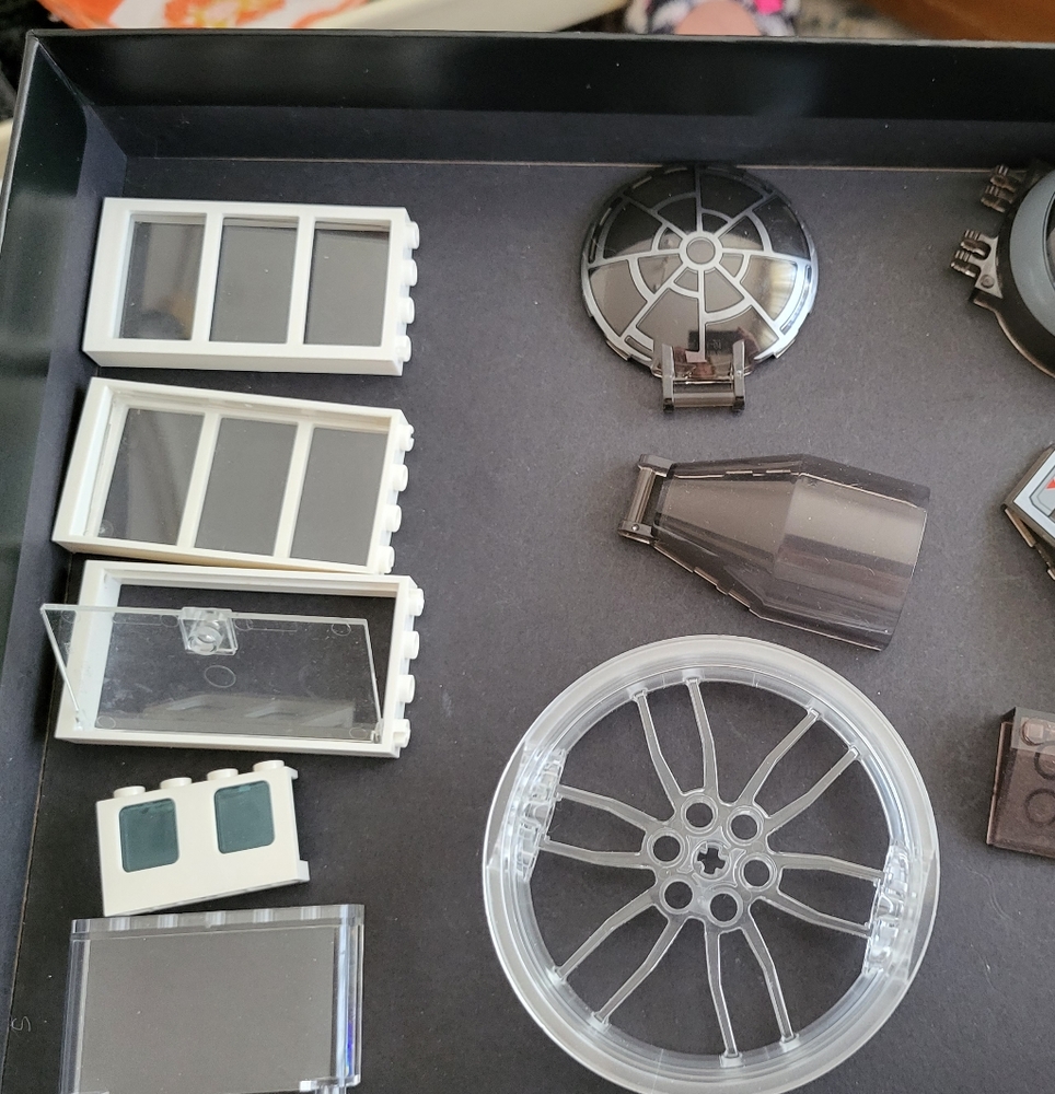 Legos lots of specialty pieces clear and smoke color